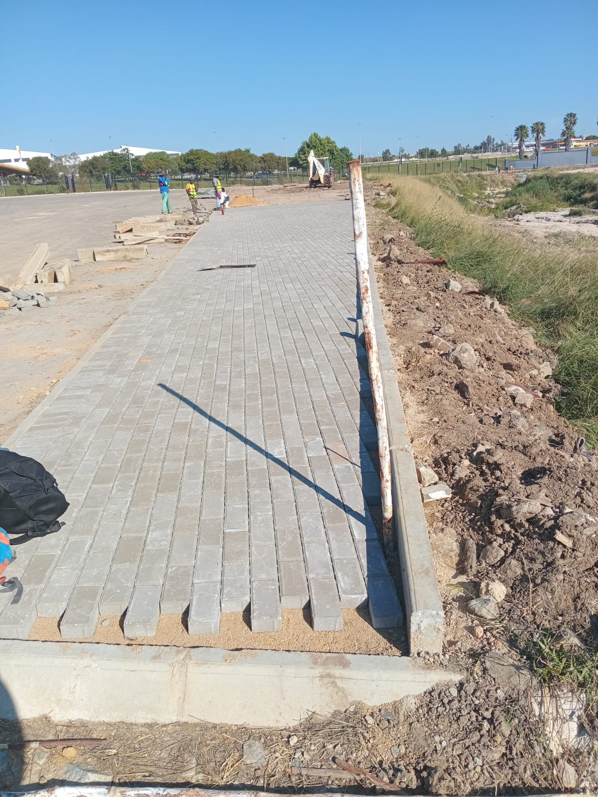 Waterproofing work in progress on a roof